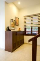 The stair lobby on the ground floor with the footwear storage cabinet.